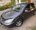 Сірий Міцубісі Lancer, об'ємом двигуна 1.58 л та пробігом 325 тис. км за 4000 $, фото 3 на Automoto.ua