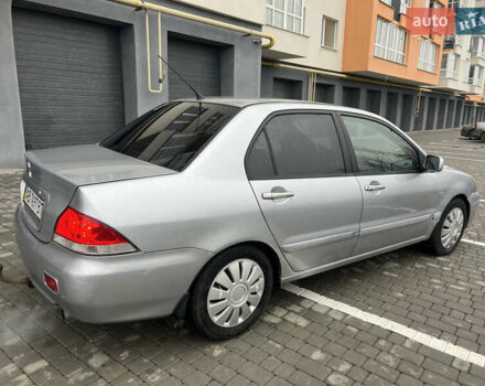 Серый Мицубиси Лансер, объемом двигателя 1.58 л и пробегом 333 тыс. км за 2600 $, фото 7 на Automoto.ua