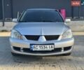 Сірий Міцубісі Lancer, об'ємом двигуна 1.58 л та пробігом 303 тис. км за 2800 $, фото 1 на Automoto.ua