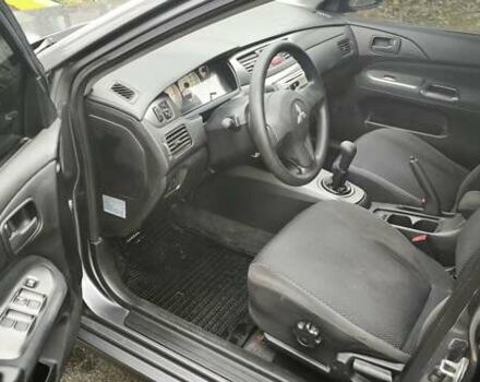 Серый Мицубиси Лансер, объемом двигателя 1.6 л и пробегом 263 тыс. км за 3650 $, фото 11 на Automoto.ua