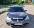 Серый Мицубиси Лансер, объемом двигателя 1.58 л и пробегом 203 тыс. км за 3300 $, фото 4 на Automoto.ua