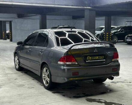 Серый Мицубиси Лансер, объемом двигателя 1.6 л и пробегом 300 тыс. км за 4600 $, фото 3 на Automoto.ua