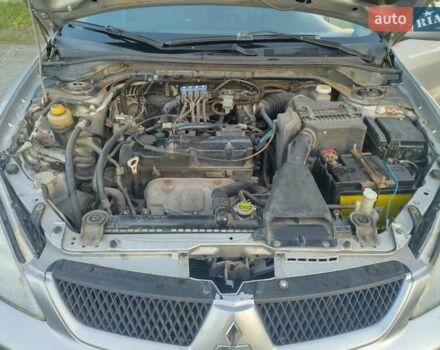 Серый Мицубиси Лансер, объемом двигателя 1.58 л и пробегом 250 тыс. км за 4700 $, фото 5 на Automoto.ua