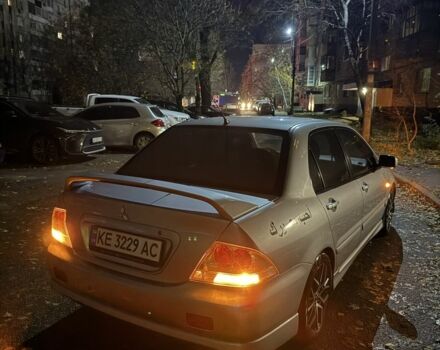 Серый Мицубиси Лансер, объемом двигателя 2 л и пробегом 256 тыс. км за 7000 $, фото 16 на Automoto.ua