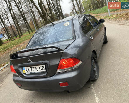 Сірий Міцубісі Lancer, об'ємом двигуна 1.6 л та пробігом 222 тис. км за 4900 $, фото 3 на Automoto.ua