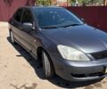Сірий Міцубісі Lancer, об'ємом двигуна 1.6 л та пробігом 165 тис. км за 4302 $, фото 1 на Automoto.ua