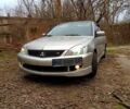 Сірий Міцубісі Lancer, об'ємом двигуна 20 л та пробігом 360 тис. км за 5500 $, фото 1 на Automoto.ua