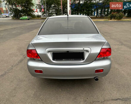 Серый Мицубиси Лансер, объемом двигателя 1.58 л и пробегом 183 тыс. км за 4800 $, фото 9 на Automoto.ua