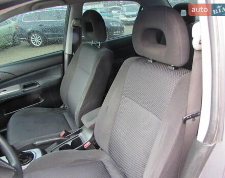 Серый Мицубиси Лансер, объемом двигателя 1.58 л и пробегом 300 тыс. км за 3600 $, фото 6 на Automoto.ua