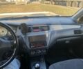 Серый Мицубиси Лансер, объемом двигателя 1.6 л и пробегом 328 тыс. км за 3200 $, фото 7 на Automoto.ua