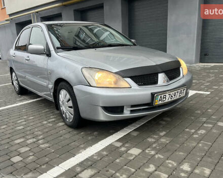 Серый Мицубиси Лансер, объемом двигателя 1.58 л и пробегом 333 тыс. км за 2650 $, фото 2 на Automoto.ua