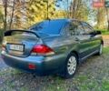 Сірий Міцубісі Lancer, об'ємом двигуна 1.6 л та пробігом 240 тис. км за 4200 $, фото 9 на Automoto.ua