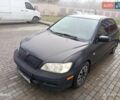 Сірий Міцубісі Lancer, об'ємом двигуна 2 л та пробігом 212 тис. км за 3333 $, фото 3 на Automoto.ua