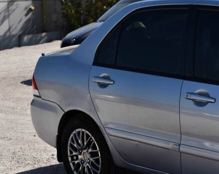 Серый Мицубиси Лансер, объемом двигателя 1.6 л и пробегом 230 тыс. км за 4550 $, фото 2 на Automoto.ua