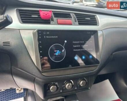 Сірий Міцубісі Lancer, об'ємом двигуна 2 л та пробігом 263 тис. км за 4300 $, фото 15 на Automoto.ua