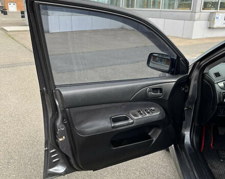 Серый Мицубиси Лансер, объемом двигателя 1.6 л и пробегом 260 тыс. км за 4998 $, фото 4 на Automoto.ua