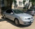 Серый Мицубиси Лансер, объемом двигателя 1.58 л и пробегом 140 тыс. км за 4800 $, фото 1 на Automoto.ua