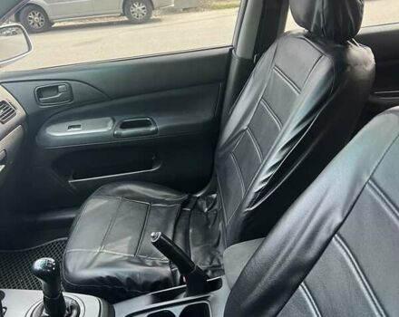 Сірий Міцубісі Lancer, об'ємом двигуна 1.58 л та пробігом 197 тис. км за 3450 $, фото 2 на Automoto.ua