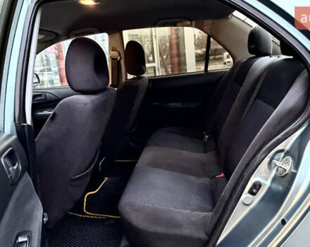 Сірий Міцубісі Lancer, об'ємом двигуна 1.58 л та пробігом 275 тис. км за 4600 $, фото 11 на Automoto.ua