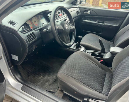 Сірий Міцубісі Lancer, об'ємом двигуна 1.58 л та пробігом 333 тис. км за 2999 $, фото 10 на Automoto.ua