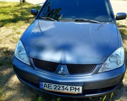 Серый Мицубиси Лансер, объемом двигателя 1.6 л и пробегом 214 тыс. км за 4500 $, фото 6 на Automoto.ua