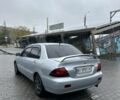 Серый Мицубиси Лансер, объемом двигателя 1.6 л и пробегом 230 тыс. км за 4497 $, фото 3 на Automoto.ua