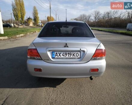 Серый Мицубиси Лансер, объемом двигателя 1.6 л и пробегом 344 тыс. км за 3400 $, фото 6 на Automoto.ua