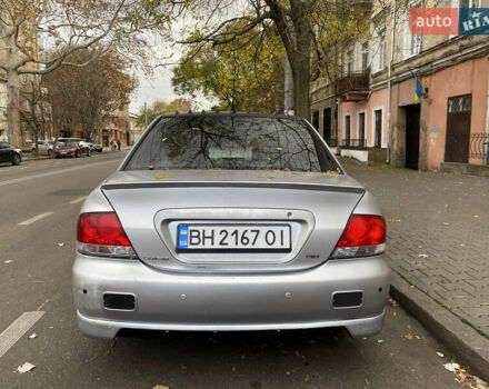 Серый Мицубиси Лансер, объемом двигателя 1.6 л и пробегом 444 тыс. км за 3400 $, фото 4 на Automoto.ua