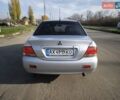 Серый Мицубиси Лансер, объемом двигателя 1.6 л и пробегом 344 тыс. км за 3400 $, фото 6 на Automoto.ua