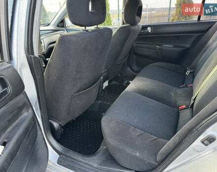Сірий Міцубісі Lancer, об'ємом двигуна 1.58 л та пробігом 333 тис. км за 2999 $, фото 14 на Automoto.ua
