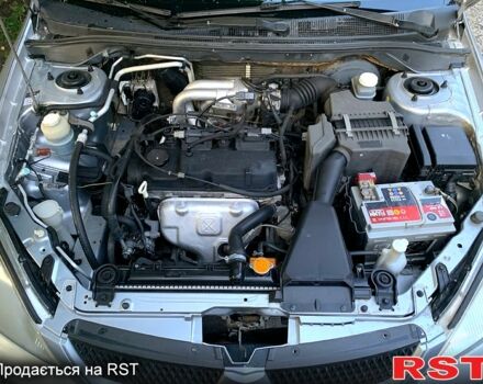 Серый Мицубиси Лансер, объемом двигателя 1.6 л и пробегом 0 тыс. км за 3999 $, фото 3 на Automoto.ua