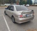 Сірий Міцубісі Lancer, об'ємом двигуна 2 л та пробігом 330 тис. км за 3450 $, фото 4 на Automoto.ua