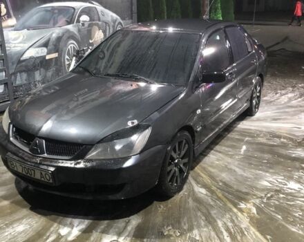 Міцубісі Lancer 2006 у Синельниковом на Automoto.ua Сірий Міцубісі Lancer, об'ємом двигуна 2 л та пробігом 200 тис. км за 3000 $, фото 6 на Automoto.ua