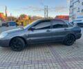 Серый Мицубиси Лансер, объемом двигателя 1.6 л и пробегом 279 тыс. км за 3990 $, фото 3 на Automoto.ua