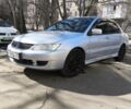 Сірий Міцубісі Lancer, об'ємом двигуна 1.6 л та пробігом 348 тис. км за 4800 $, фото 10 на Automoto.ua