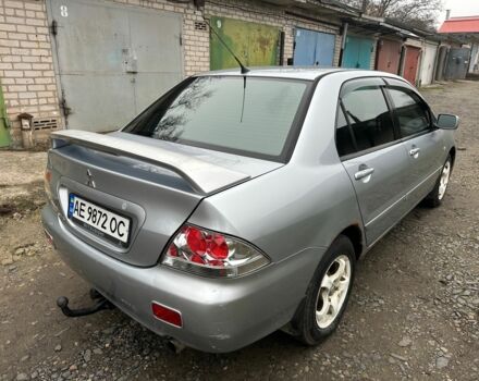 Сірий Міцубісі Lancer, об'ємом двигуна 1.6 л та пробігом 270 тис. км за 2900 $, фото 5 на Automoto.ua