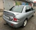 Сірий Міцубісі Lancer, об'ємом двигуна 1.6 л та пробігом 270 тис. км за 2900 $, фото 5 на Automoto.ua
