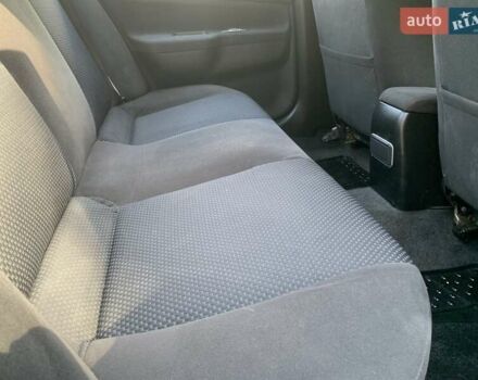Сірий Міцубісі Lancer, об'ємом двигуна 1.58 л та пробігом 276 тис. км за 3650 $, фото 10 на Automoto.ua