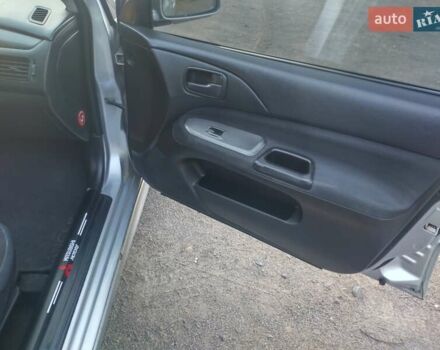 Серый Мицубиси Лансер, объемом двигателя 1.58 л и пробегом 250 тыс. км за 4700 $, фото 11 на Automoto.ua