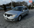 Сірий Міцубісі Lancer, об'ємом двигуна 1.58 л та пробігом 333 тис. км за 2999 $, фото 1 на Automoto.ua