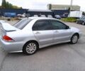 Сірий Міцубісі Lancer, об'ємом двигуна 1.6 л та пробігом 300 тис. км за 2999 $, фото 6 на Automoto.ua