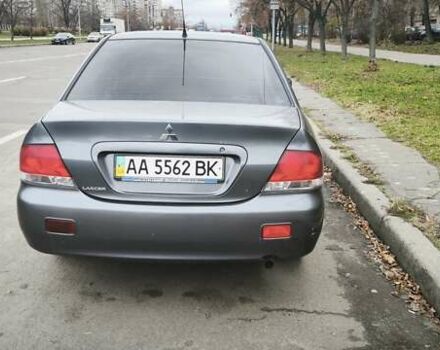 Серый Мицубиси Лансер, объемом двигателя 1.6 л и пробегом 263 тыс. км за 3650 $, фото 7 на Automoto.ua