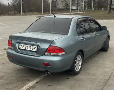 Сірий Міцубісі Lancer, об'ємом двигуна 1.58 л та пробігом 267 тис. км за 5300 $, фото 2 на Automoto.ua