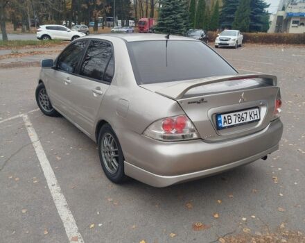 Сірий Міцубісі Lancer, об'ємом двигуна 2 л та пробігом 330 тис. км за 3450 $, фото 5 на Automoto.ua