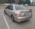 Сірий Міцубісі Lancer, об'ємом двигуна 2 л та пробігом 330 тис. км за 3450 $, фото 5 на Automoto.ua