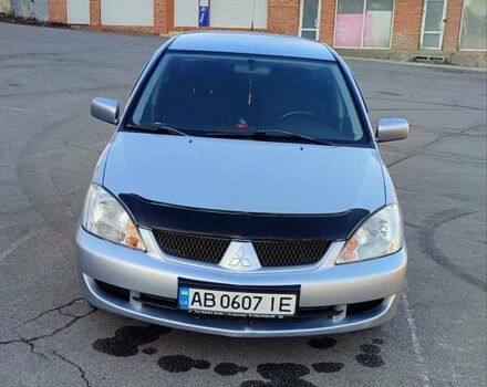 Сірий Міцубісі Lancer, об'ємом двигуна 1.58 л та пробігом 207 тис. км за 4300 $, фото 7 на Automoto.ua