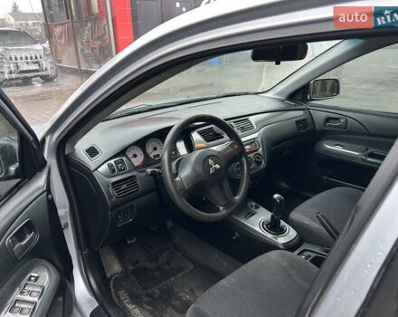 Сірий Міцубісі Lancer, об'ємом двигуна 1.6 л та пробігом 223 тис. км за 3900 $, фото 11 на Automoto.ua