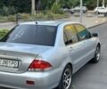 Серый Мицубиси Лансер, объемом двигателя 1.6 л и пробегом 320 тыс. км за 3700 $, фото 4 на Automoto.ua