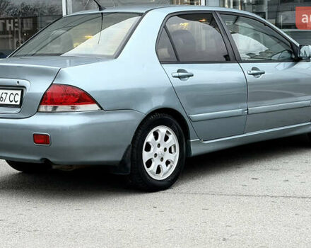 Сірий Міцубісі Lancer, об'ємом двигуна 1.58 л та пробігом 275 тис. км за 4600 $, фото 5 на Automoto.ua