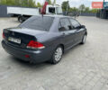 Сірий Міцубісі Lancer, об'ємом двигуна 1.58 л та пробігом 162 тис. км за 4650 $, фото 3 на Automoto.ua
